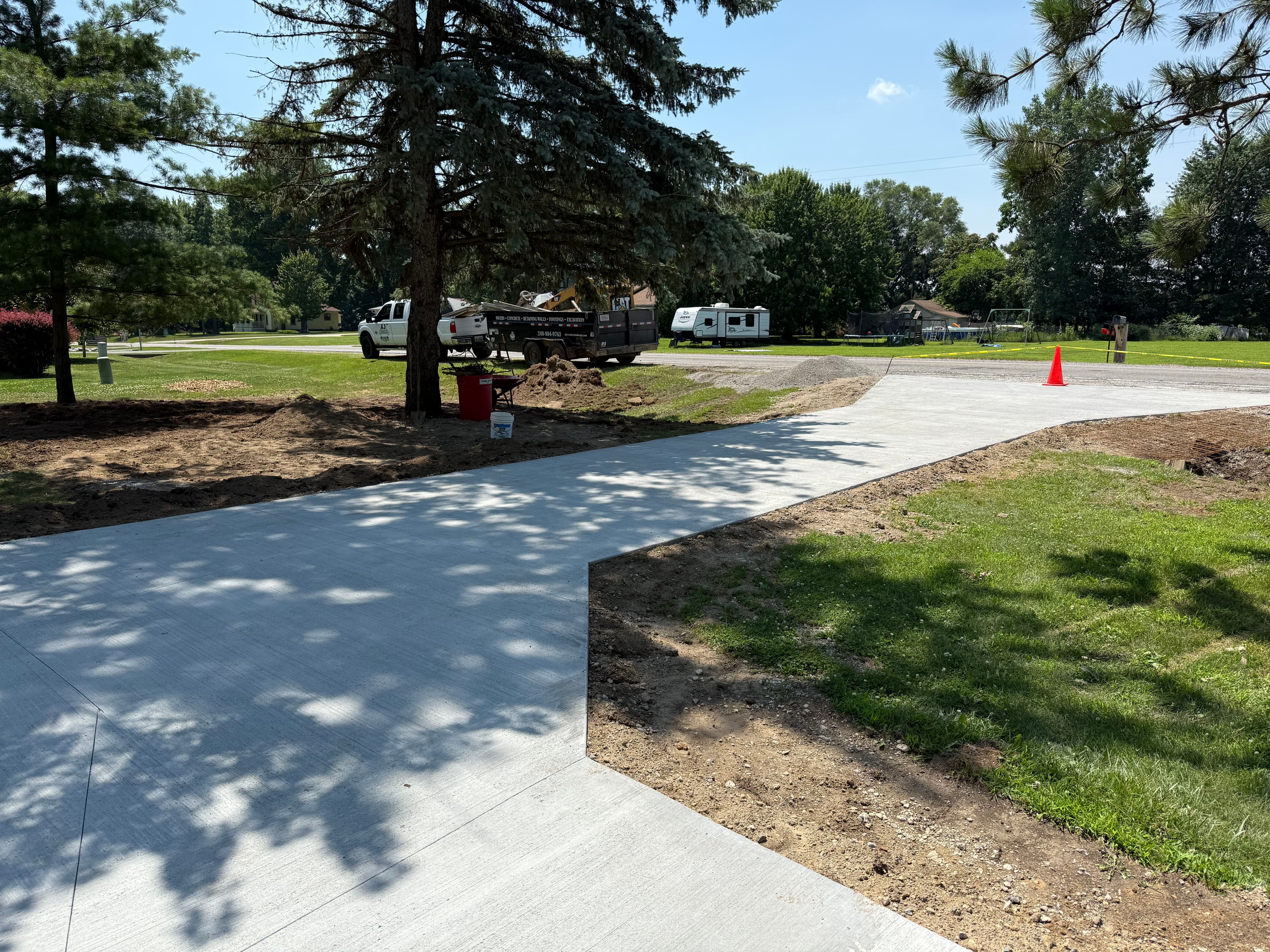 Project Concrete Driveway and Paver Walkway Transformation image