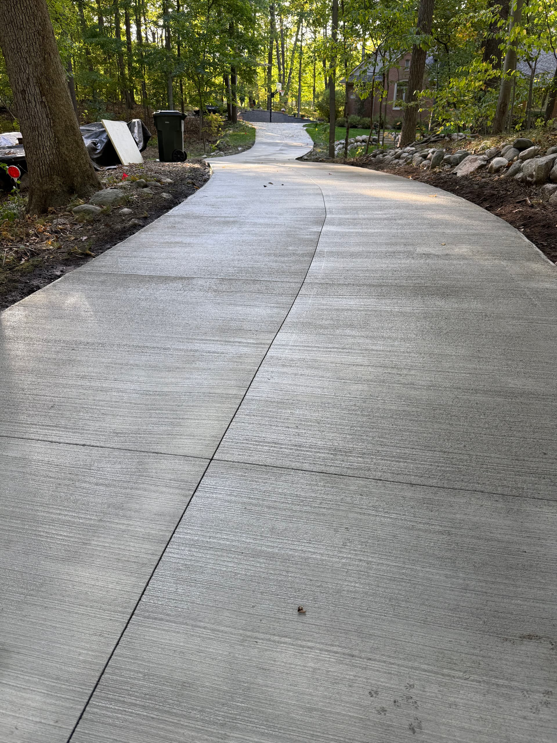 Gallery photos for Smooth New Concrete Driveway Installed in Scenic Woodland: Image #2