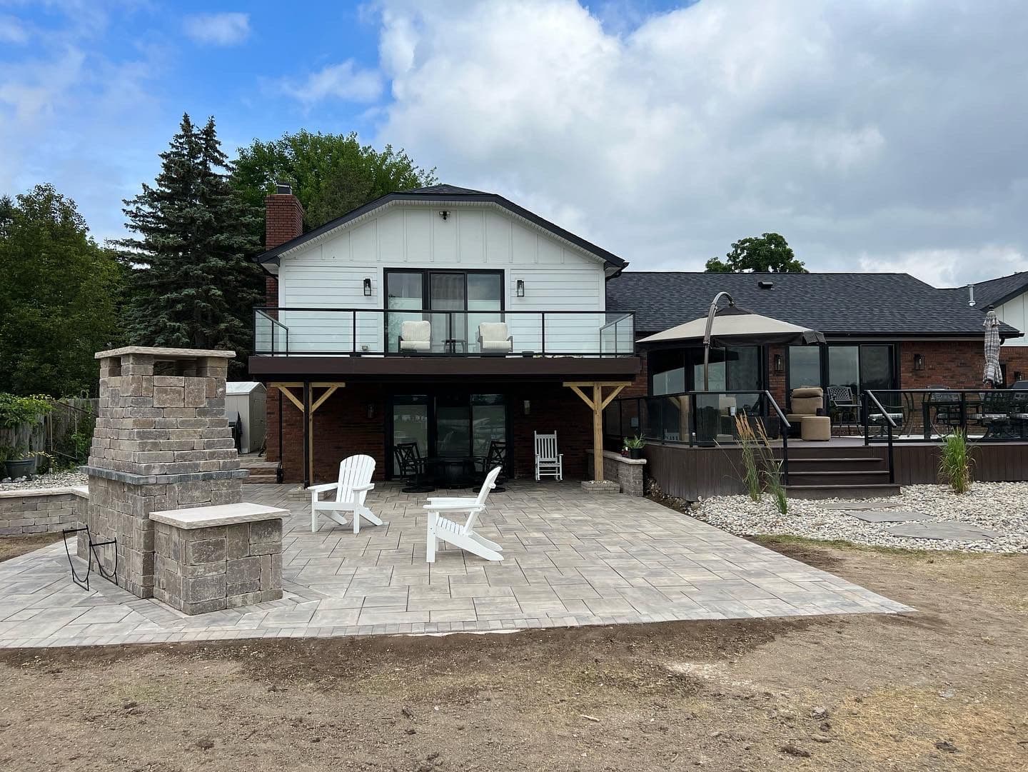 Gallery photos for Backyard Transformation with Retaining Walls and Custom Pavers: Image #1