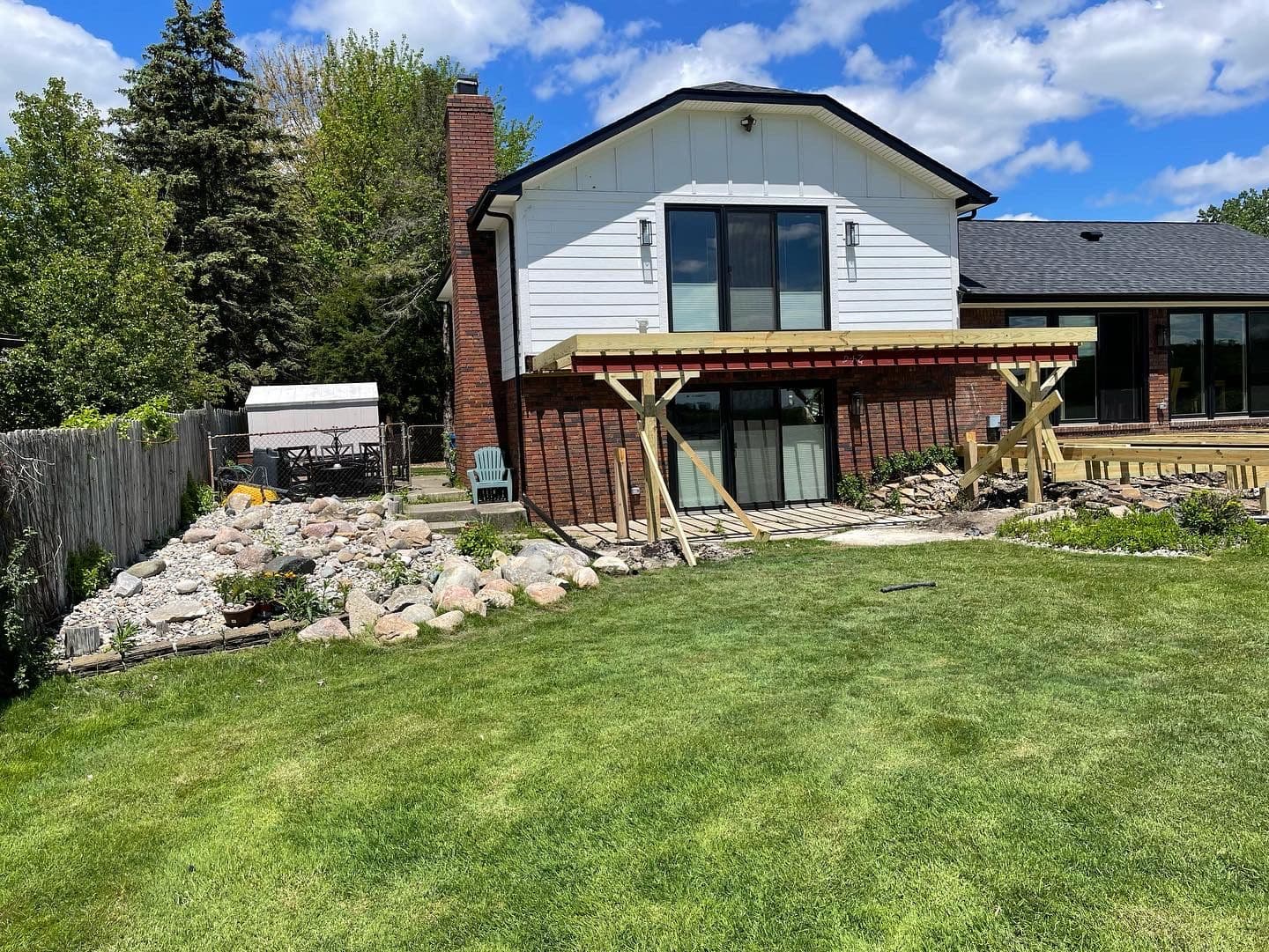 Backyard Transformation with Retaining Walls and Custom Pavers