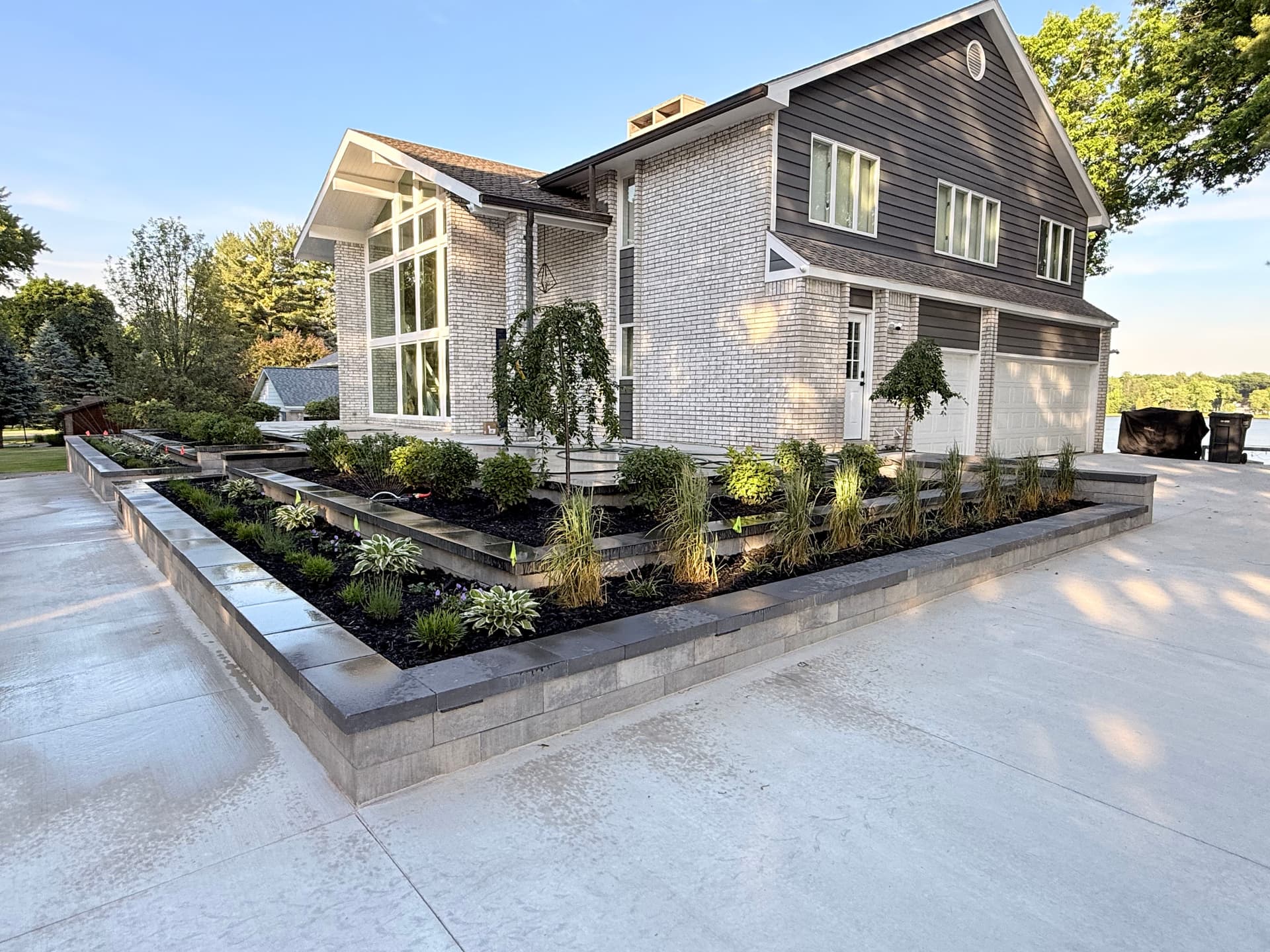 Gallery photos for Modern Landscape Design with Retaining Walls, Concrete Driveway and Lighting: Image #3