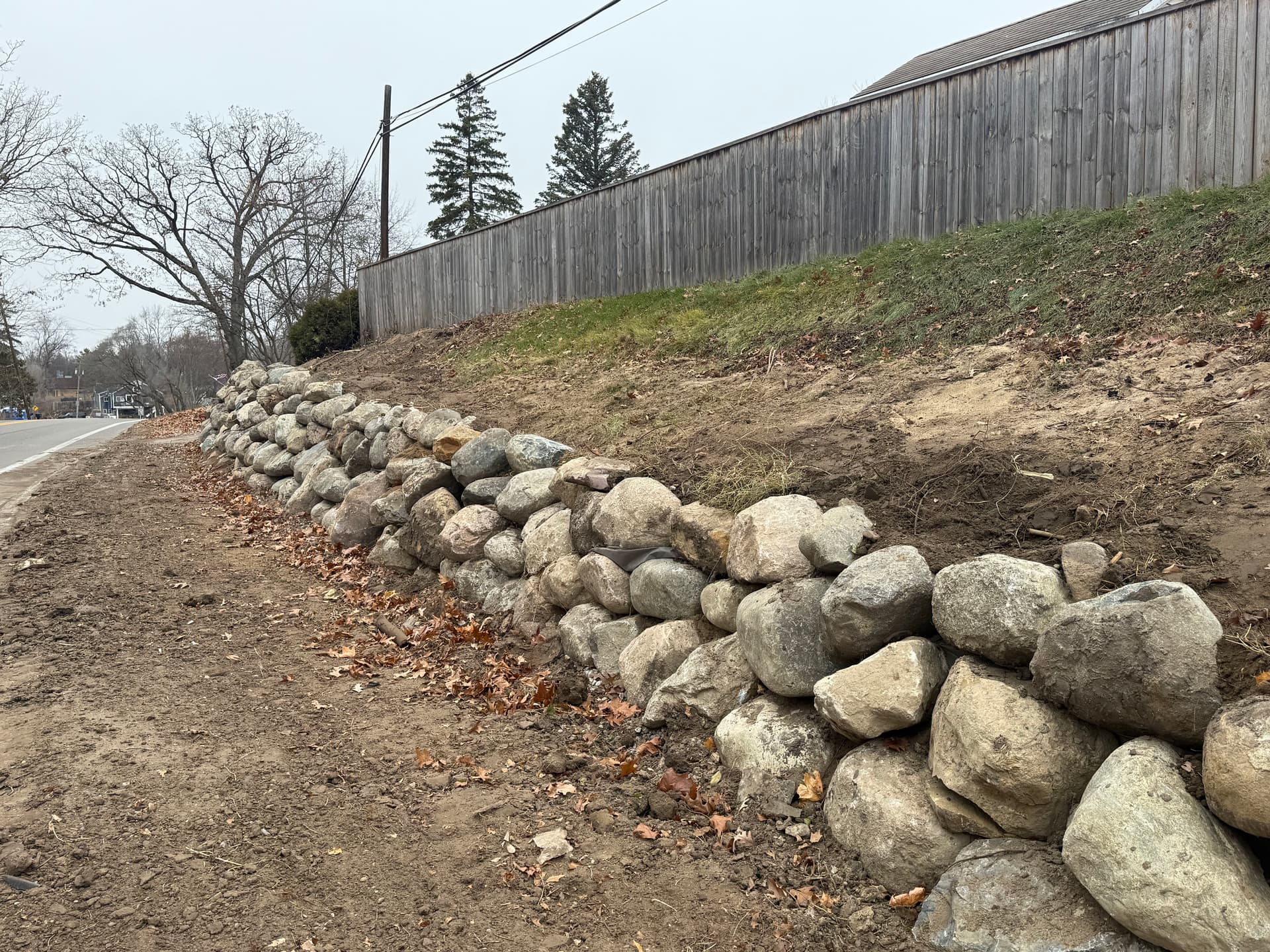 Gallery photos for Enhancing Outdoor Spaces with Boulder Retaining Walls and Limestone Steps: Image #1