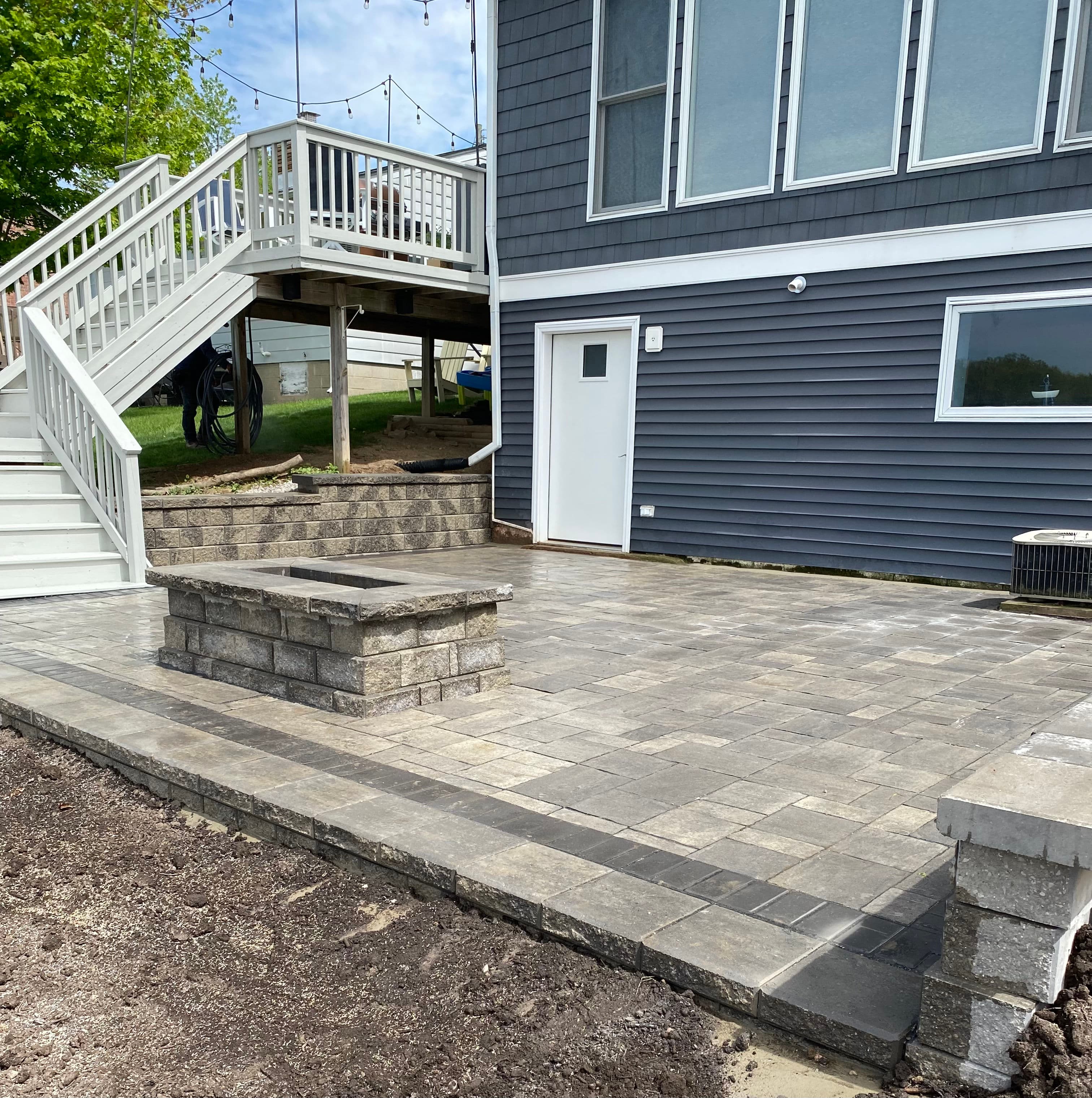 Project Outdoor Living Enhancement with Retaining Walls and Pavers image
