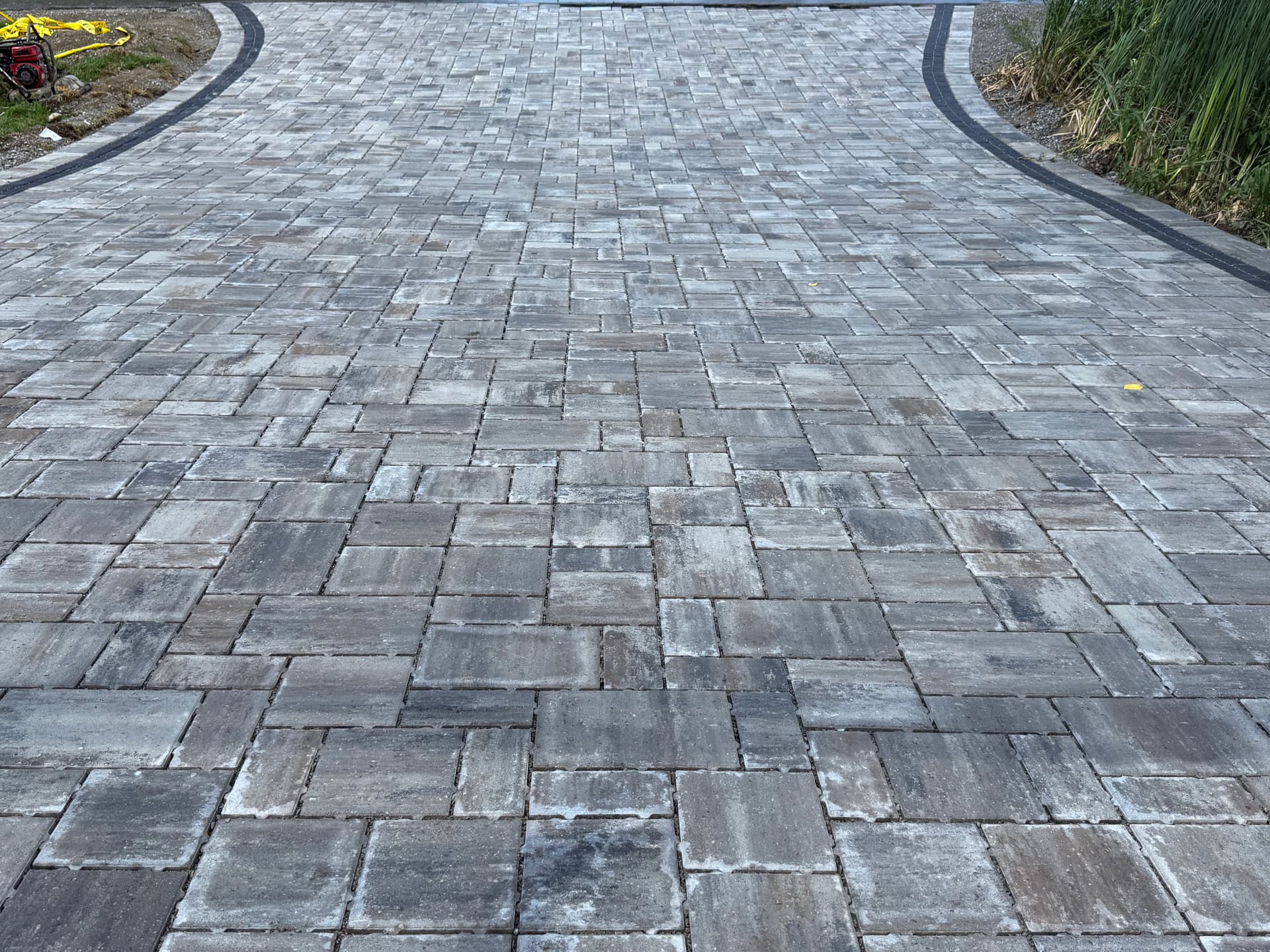 Gallery photos for Cracked Concrete Driveway Gets a Full Paver Upgrade With Charcoal Border: Image #3